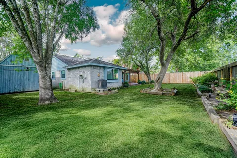 a view of backyard with green space