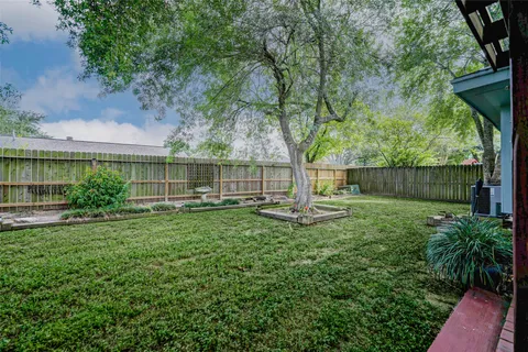a view of a patio with wooden floor