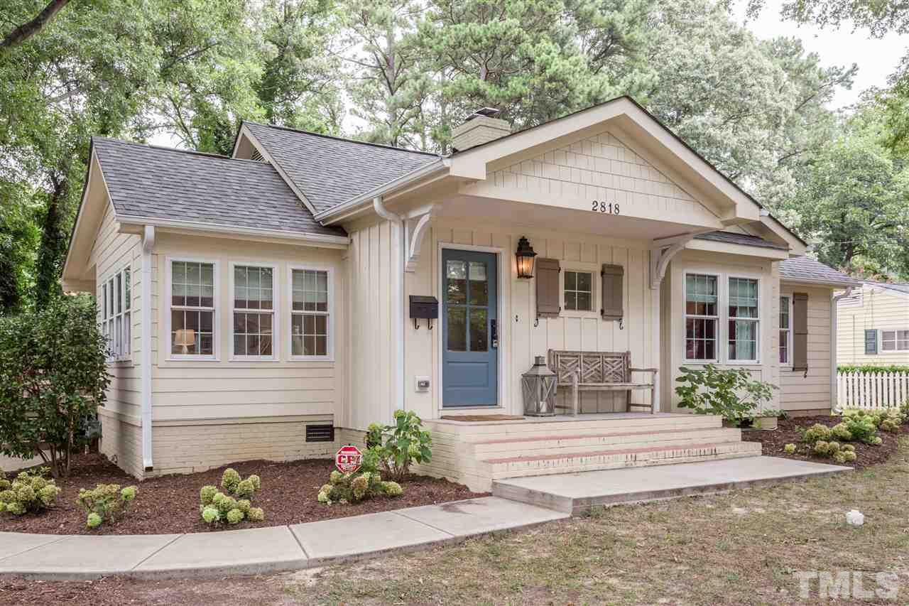 2818 Fowler Avenue Raleigh, NC 27607 - Photo 1 of 25 a front view of a house with a yard