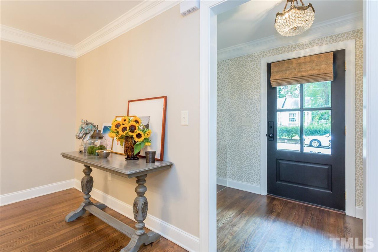 2818 Fowler Avenue Raleigh, NC 27607 - Photo 2 of 25 a dining room with furniture and wooden floor