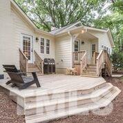 2818 Fowler Avenue Raleigh, NC 27607 - Photo 22 of 25 a view of a house with backyard