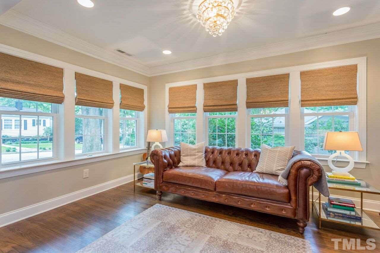 2818 Fowler Avenue Raleigh, NC 27607 - Photo 6 of 25 a living room with furniture and a large window
