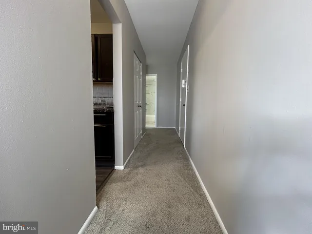 a kitchen with a stove and a sink