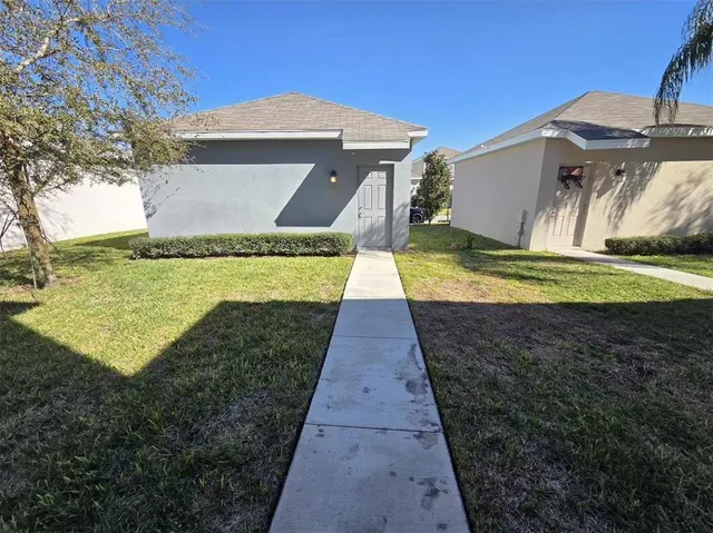 a view of a yard with an outdoor space