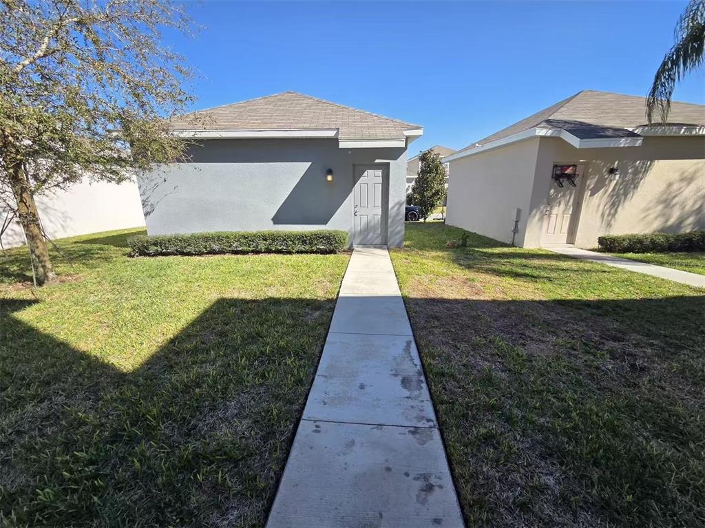 16147 Water Spring Boulevard Winter Garden, FL 34787 - Photo 11 of 17 a view of a yard with an outdoor space