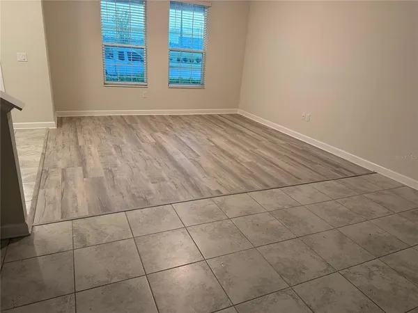 an empty room with windows