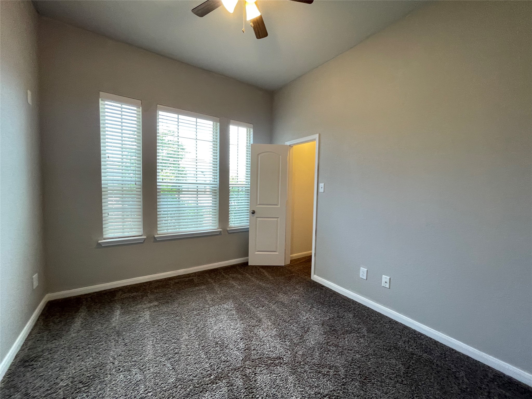 8113 Northgate Loop Temple, TX 76502 - Photo 25 of 35 Room featuring gray-tone carpeting and light gray wall paint