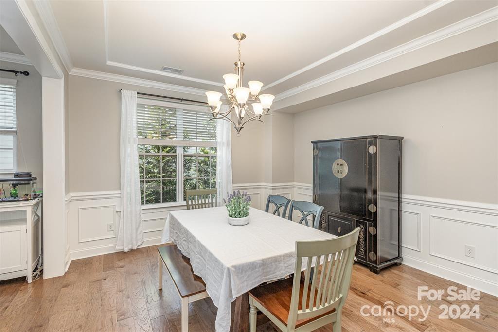 1040 Emory Lane Fort Mill, SC 29708 - Photo 7 of 48 a view of a dining room with furniture window and wooden floor