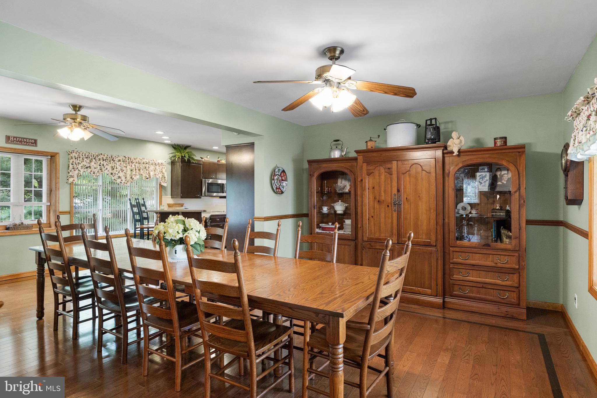 10 Cedar Brook Road Sicklerville, NJ 08081 - Photo 11 of 52 a view of a dining room with furniture and wooden floor