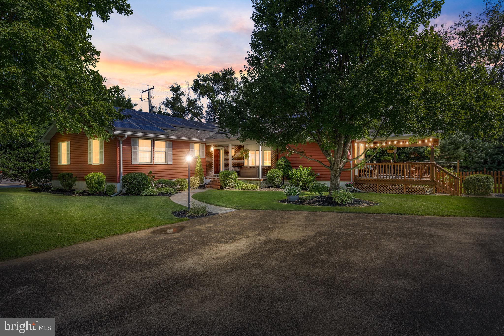 10 Cedar Brook Road Sicklerville, NJ 08081 - Photo 2 of 52 a view of a house with a big yard and large trees