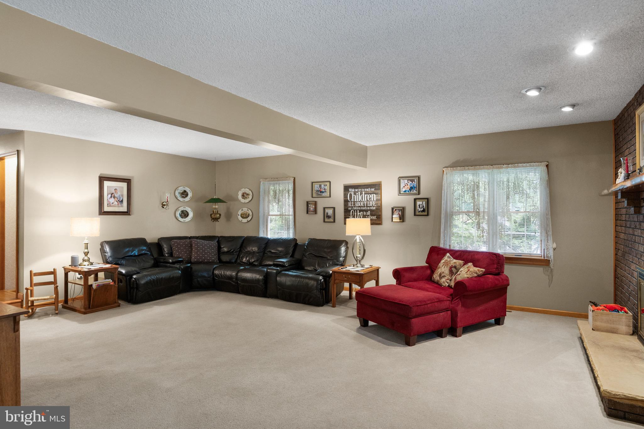 10 Cedar Brook Road Sicklerville, NJ 08081 - Photo 21 of 52 a living room with furniture a table and a window