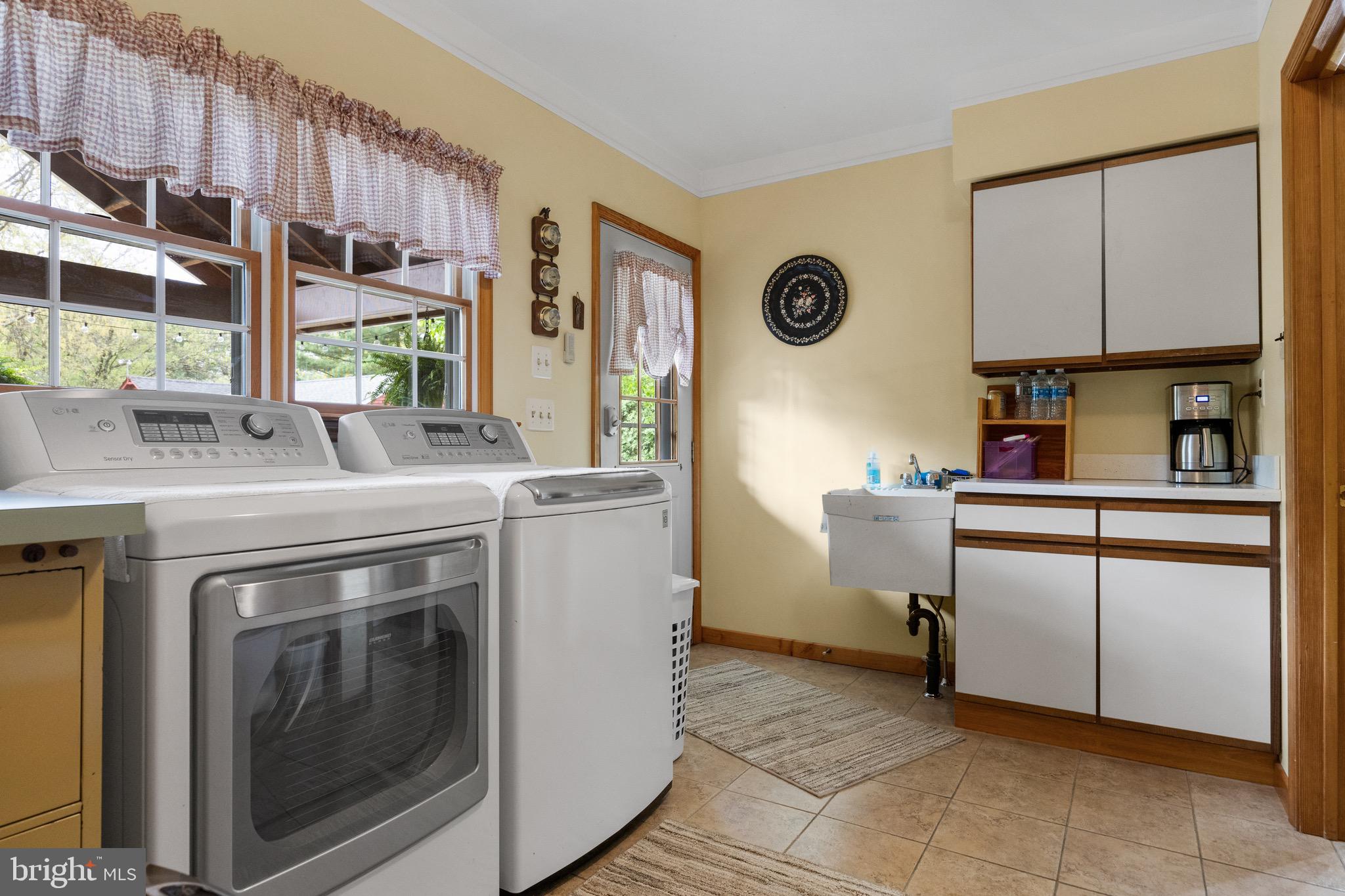 10 Cedar Brook Road Sicklerville, NJ 08081 - Photo 22 of 52 a kitchen with cabinets and window