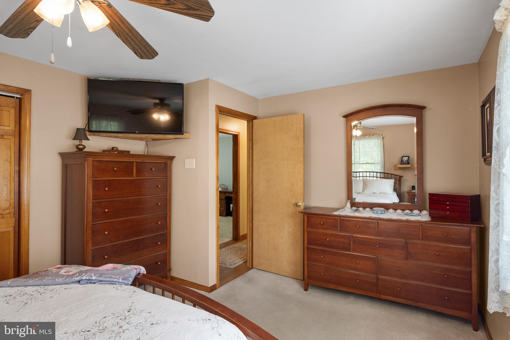 10 Cedar Brook Road Sicklerville, NJ 08081 - Photo 26 of 52 a bedroom with a bed and furniture