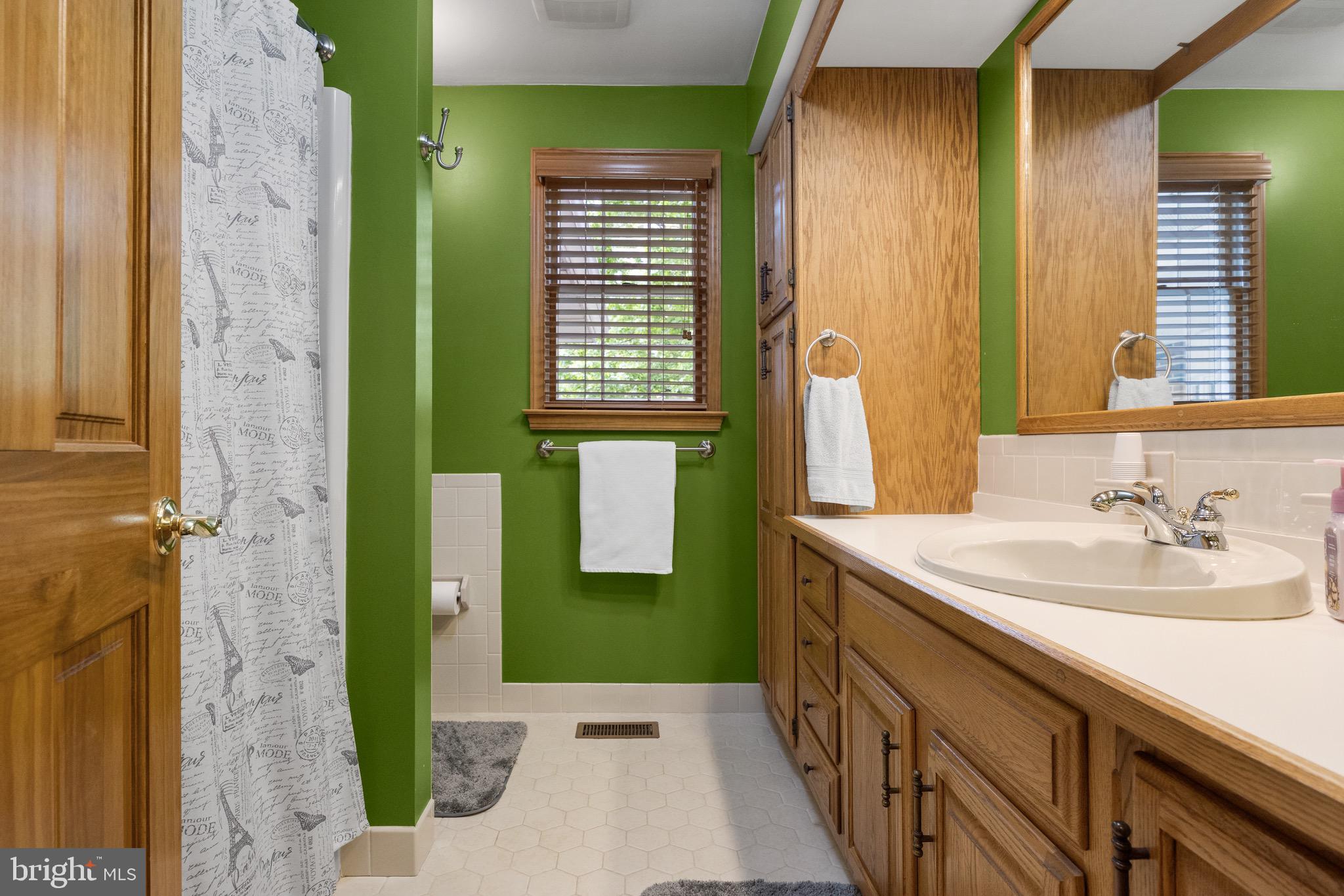 10 Cedar Brook Road Sicklerville, NJ 08081 - Photo 29 of 52 a bathroom with a sink and a mirror