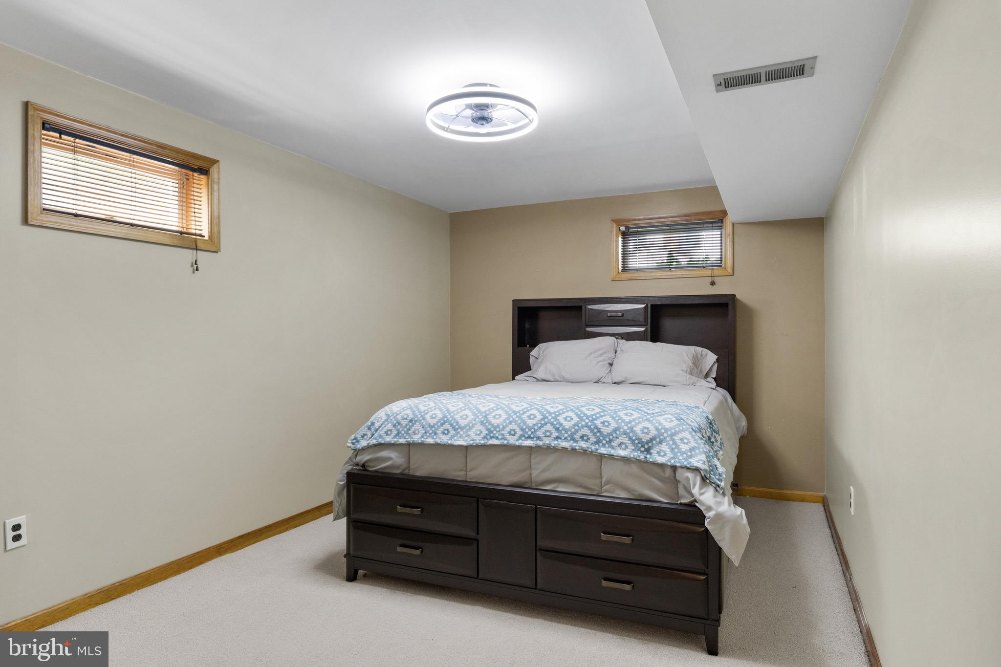 10 Cedar Brook Road Sicklerville, NJ 08081 - Photo 32 of 52 a bedroom with a bed and a window