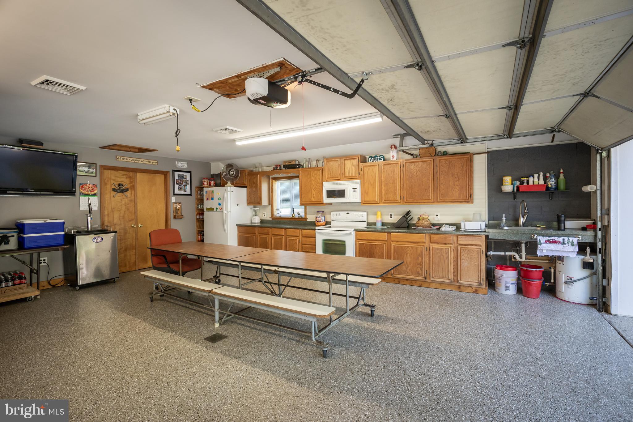 10 Cedar Brook Road Sicklerville, NJ 08081 - Photo 41 of 52 a living room with lots of furniture and a kitchen