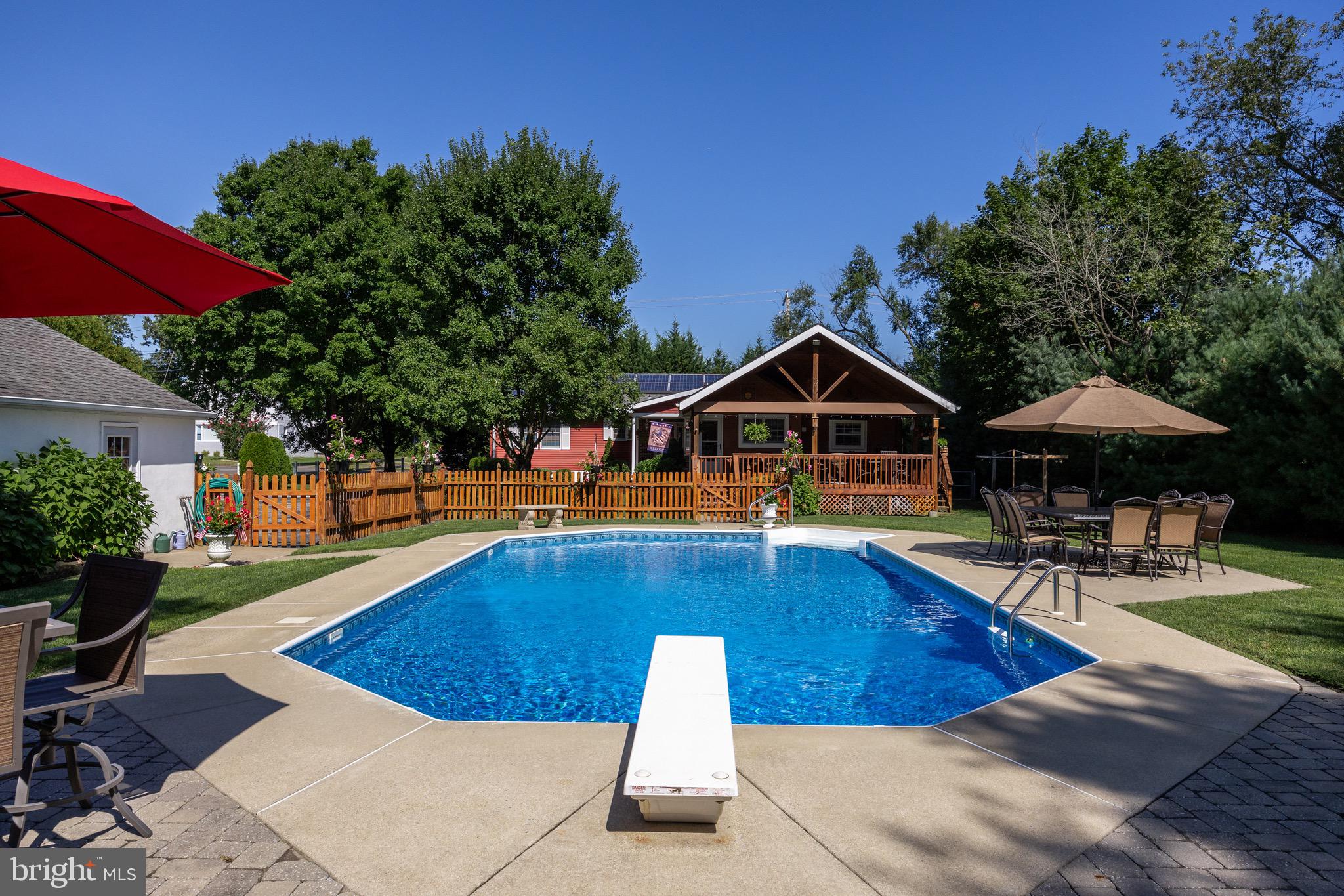 10 Cedar Brook Road Sicklerville, NJ 08081 - Photo 45 of 52 a view of swimming pool with sitting area