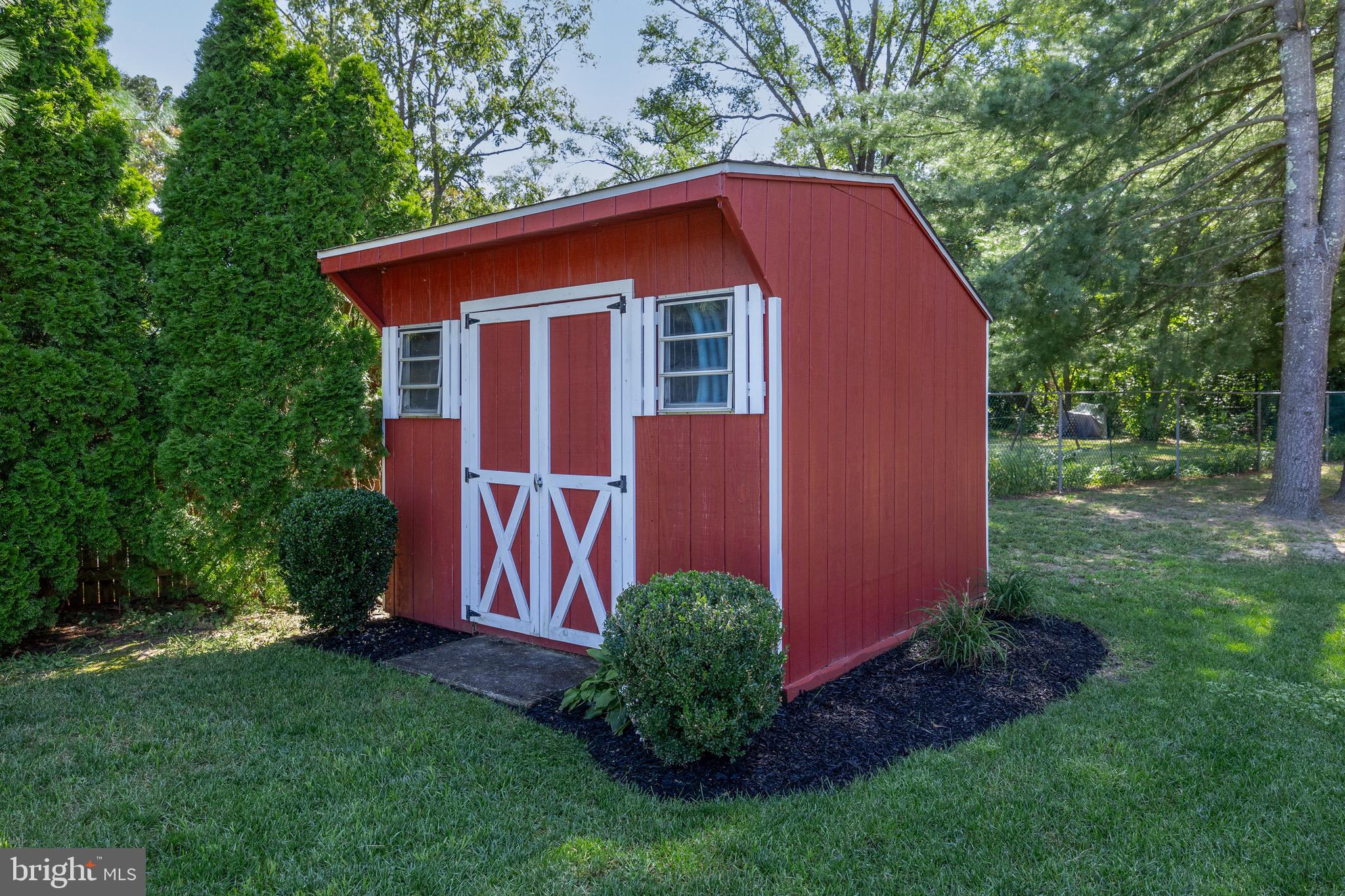 10 Cedar Brook Road Sicklerville, NJ 08081 - Photo 47 of 52 a brick house with garden in front of it