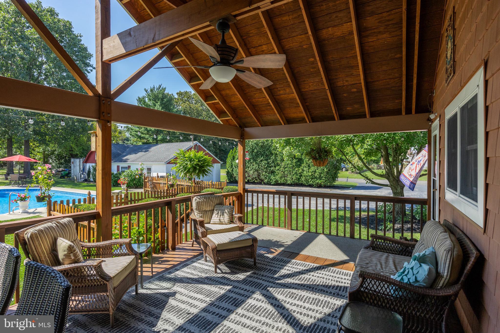 10 Cedar Brook Road Sicklerville, NJ 08081 - Photo 10 of 52 a view of a chair and tables in the balcony