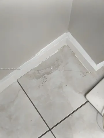 a view of a lake with houses in the back