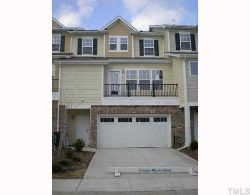 9154 Wooden Road, Unit 270 Raleigh, NC 27617 - Photo 3 of 12 The rear view of the home has so much character that you might mistake it for the front! Six windows, master BR terrace, 2-car garage, four parking spaces, street parking for visitors, seperate entry door to garage, hardiplank siding and shakes.