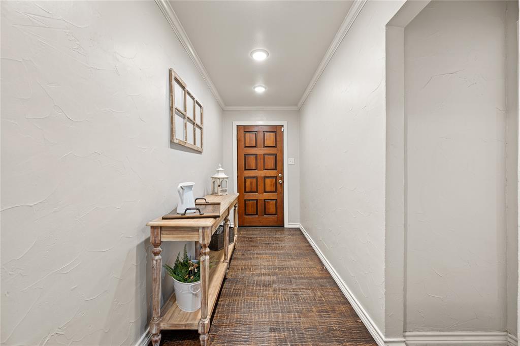 101 Ranch Road Krugerville, TX 76227 - Photo 13 of 39 a view of a hallway with workspace