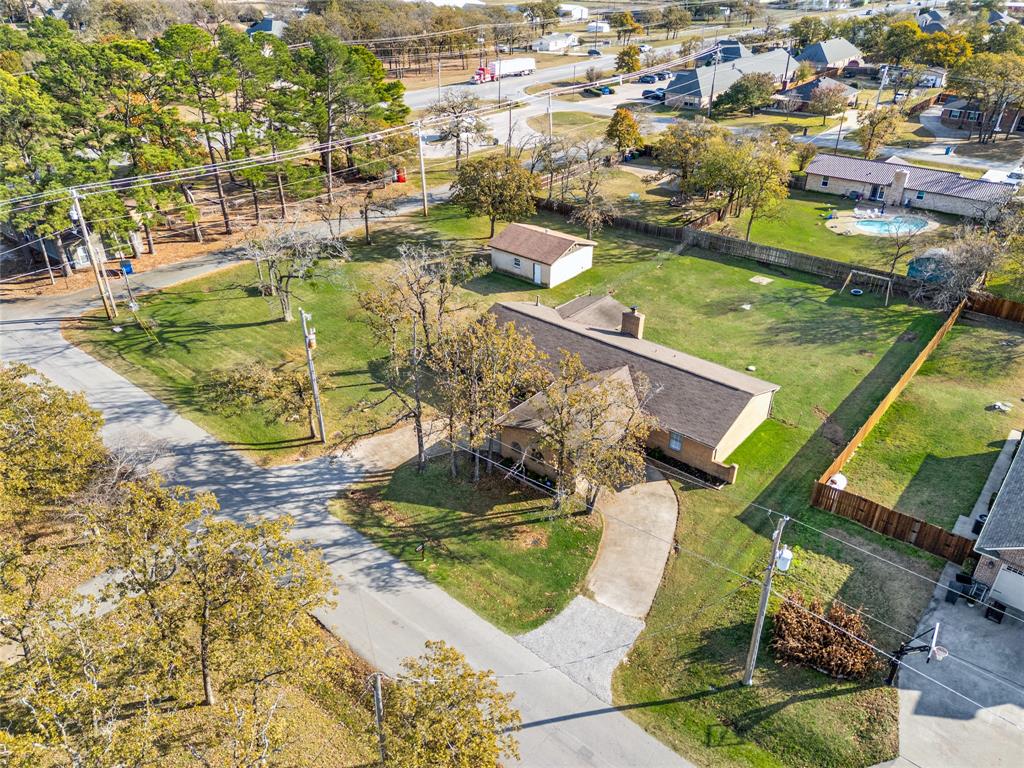 101 Ranch Road Krugerville, TX 76227 - Photo 2 of 39 a view of a lake with a house
