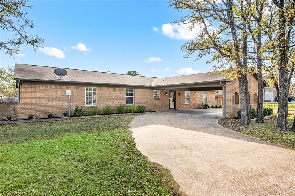 101 Ranch Road Krugerville, TX 76227 - Photo 7 of 39 a front view of a house with a yard and garage