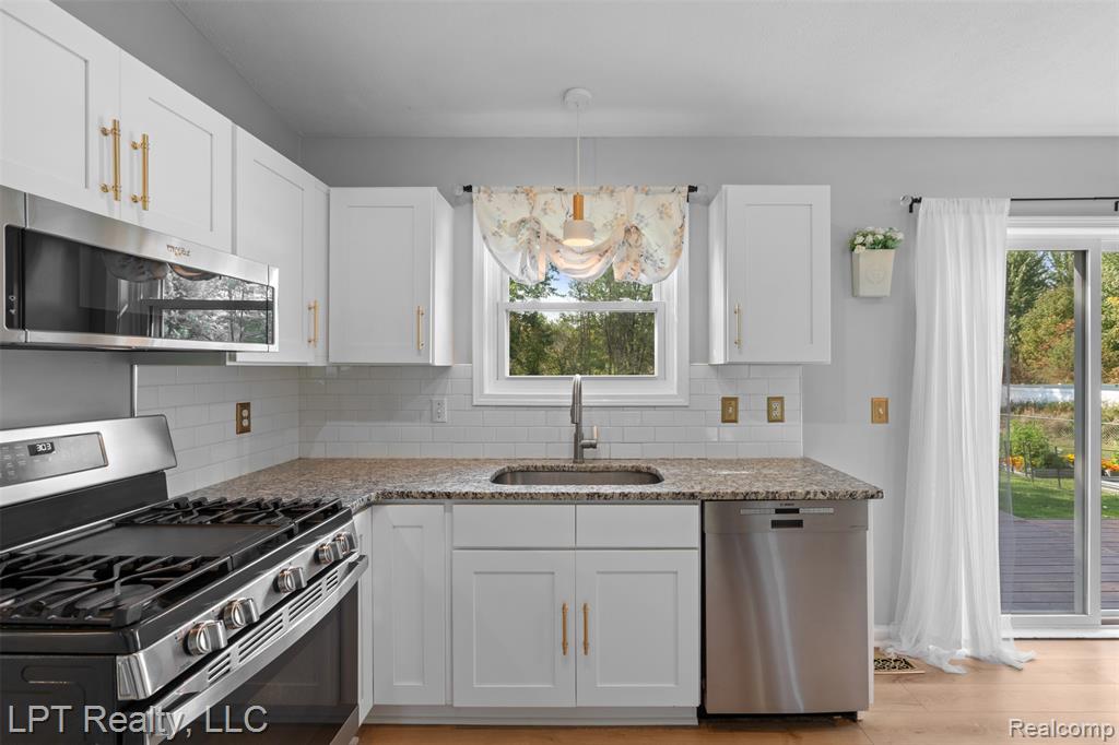 411 Fowlerville Road Fowlerville, MI 48836 - Photo 4 of 22