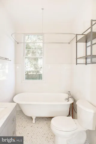 a bathroom with a sink and bathtub