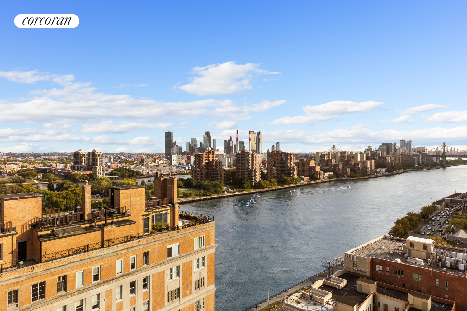 10 East End Avenue, Unit PH21D Manhattan, NY 10075 - Photo 18 of 19 a view of a lake with a building in front of it