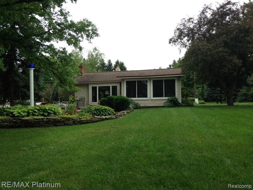 2979 Rubbins Road Howell, MI 48843 - Photo 1 of 17 Triangle Lake lakeside view.jpg