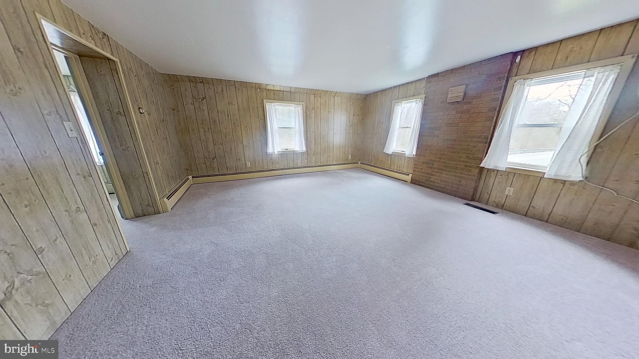 956 Toad Valley Road Glen Rock, PA 17327 - Photo 11 of 11 an empty room with windows