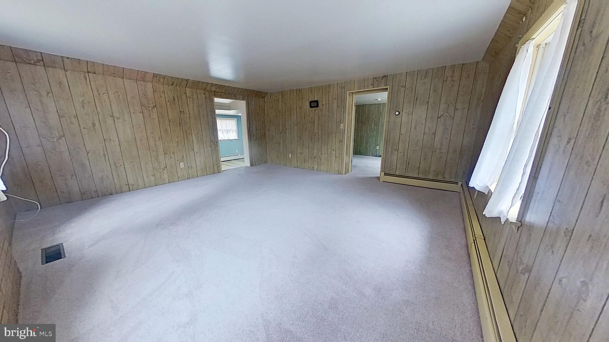 956 Toad Valley Road Glen Rock, PA 17327 - Photo 10 of 11 an empty room with windows