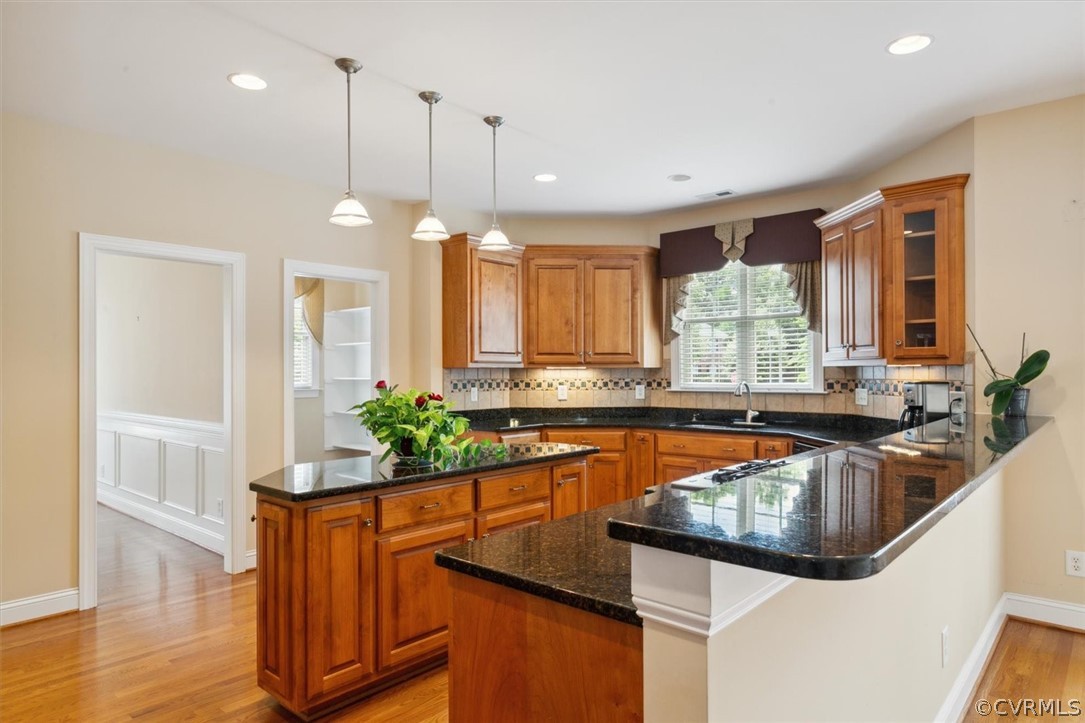 4035 Powhatan Secondary Williamsburg, VA 23188 - Photo 19 of 50 a kitchen with large window sink and cabinets
