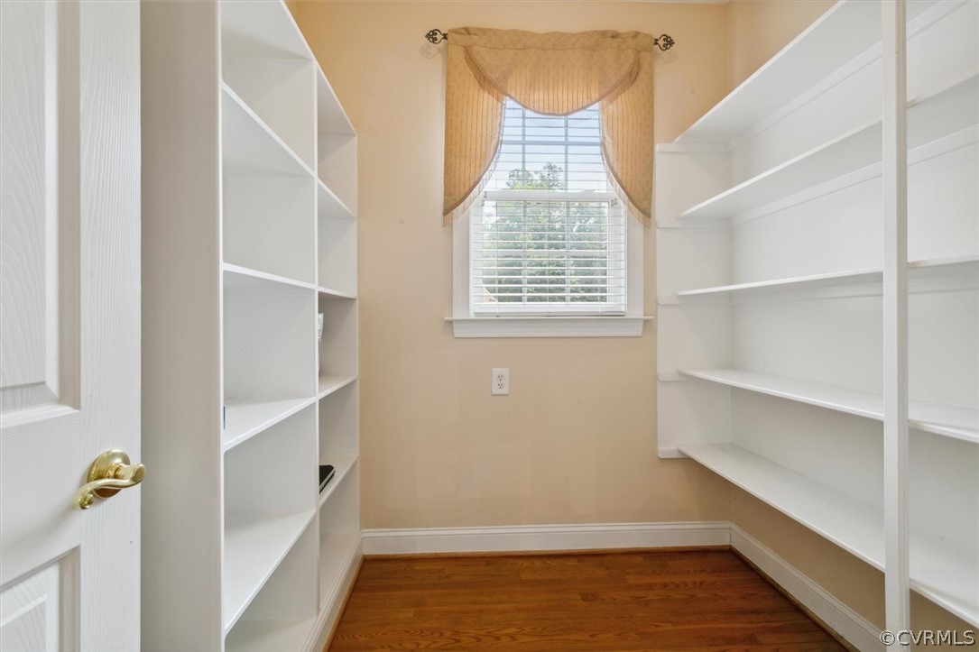 4035 Powhatan Secondary Williamsburg, VA 23188 - Photo 24 of 50 a view of walk in closet with empty racks
