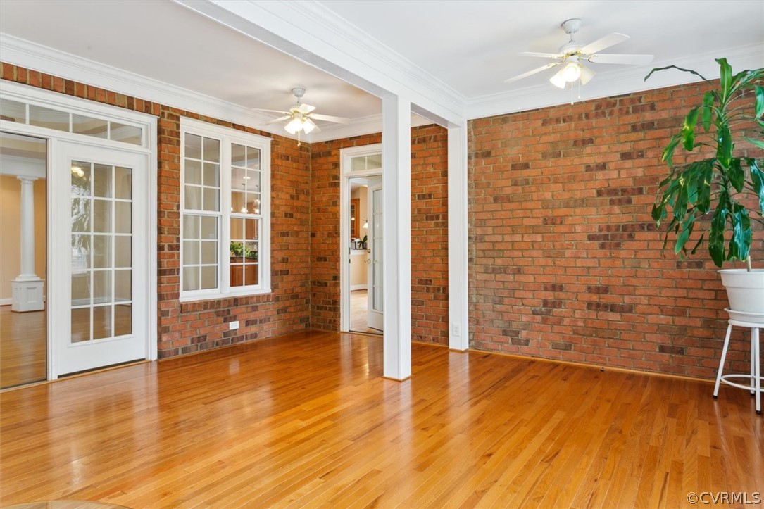 4035 Powhatan Secondary Williamsburg, VA 23188 - Photo 25 of 50 wooden floor in an empty room with a window