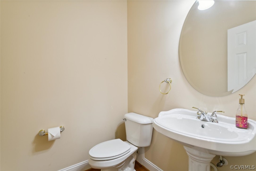 4035 Powhatan Secondary Williamsburg, VA 23188 - Photo 27 of 50 a bathroom with a sink toilet and a mirror