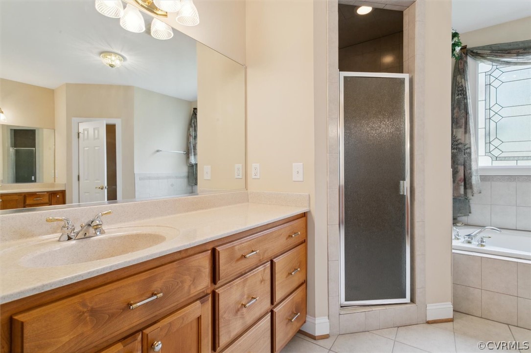 4035 Powhatan Secondary Williamsburg, VA 23188 - Photo 30 of 50 a bathroom with a sink double vanity and a mirror