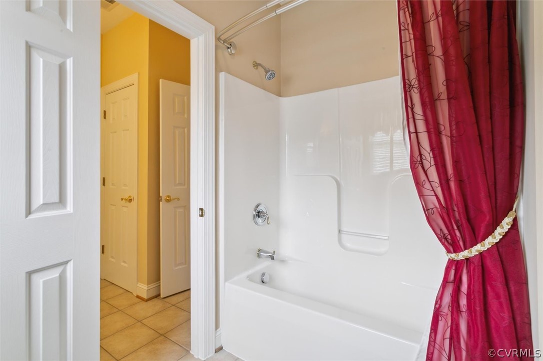 4035 Powhatan Secondary Williamsburg, VA 23188 - Photo 37 of 50 a bathroom with a bathtub and a shower