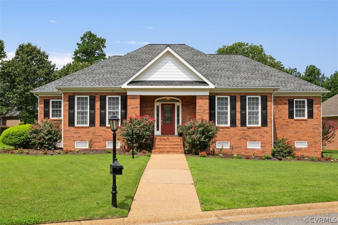 4035 Powhatan Secondary Williamsburg, VA 23188 - Photo 4 of 50 a front view of a house with garden