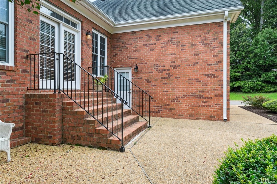 4035 Powhatan Secondary Williamsburg, VA 23188 - Photo 43 of 50 front view of a house with a yard