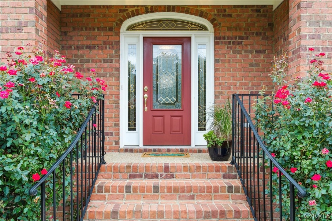 4035 Powhatan Secondary Williamsburg, VA 23188 - Photo 5 of 50 a front view of a house with a porch
