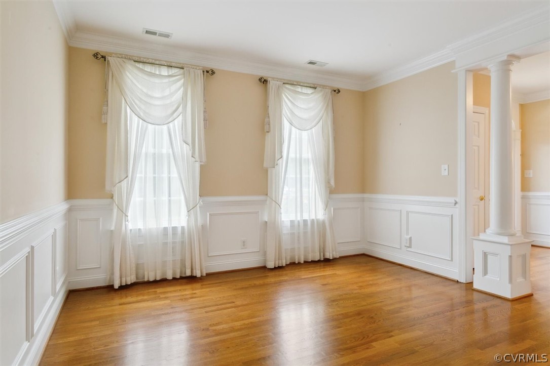 4035 Powhatan Secondary Williamsburg, VA 23188 - Photo 9 of 50 a view of an empty room with a window and wooden floor