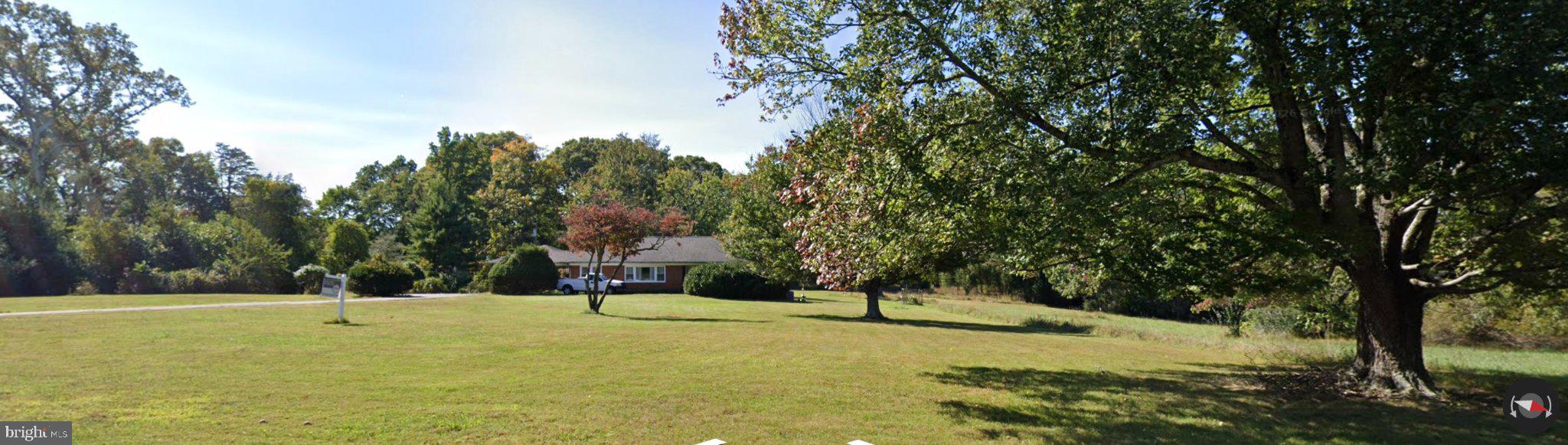 900 Seneca Road Great Falls, VA 22066 - Photo 2 of 4 a house view with a trees