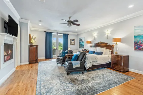 a living room with furniture and a rug
