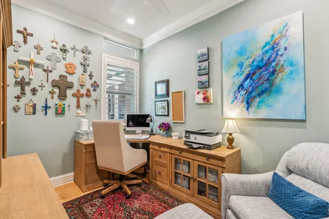 a work room with furniture and a window