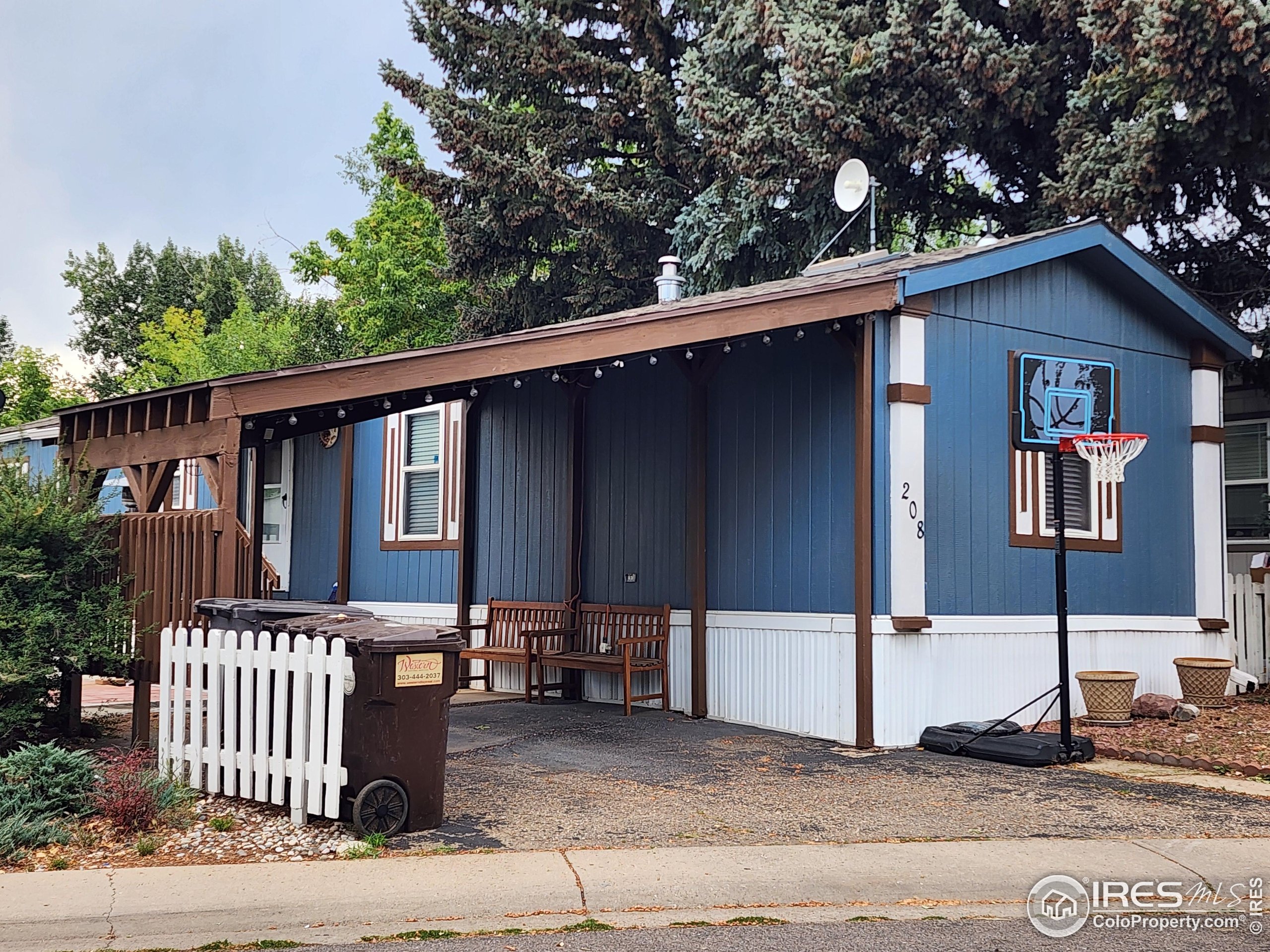 5000 Butte Street, Unit 208 Boulder, CO 80301 - Photo 2 of 37 a backyard of a house with seating space