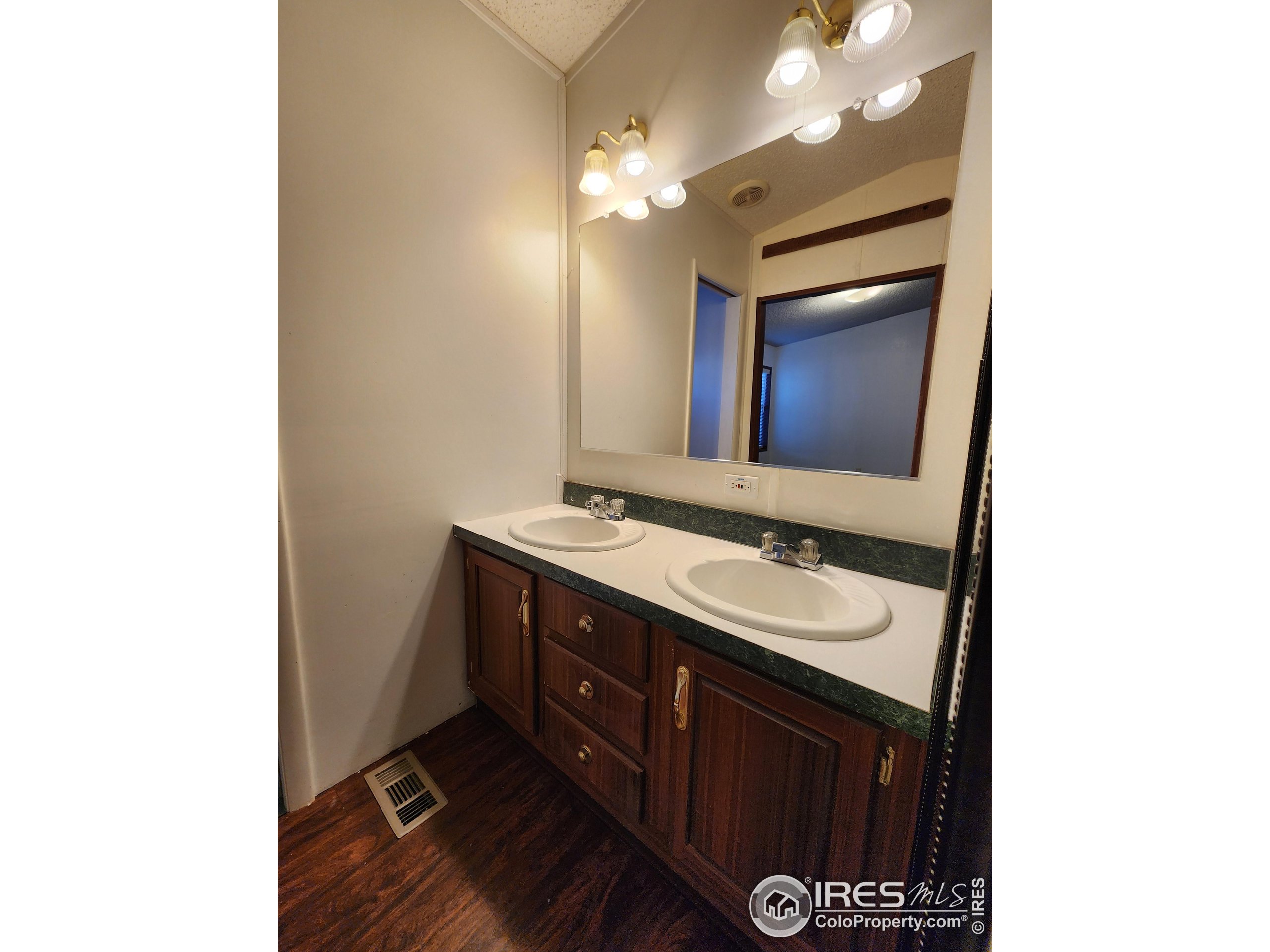 5000 Butte Street, Unit 208 Boulder, CO 80301 - Photo 23 of 37 a bathroom with a sink and a mirror
