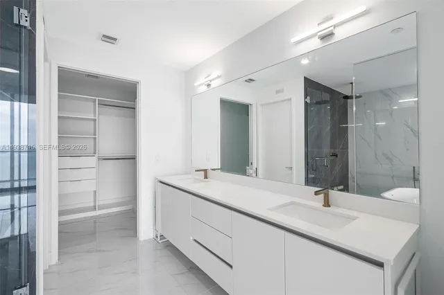 a view of an empty walk in closet